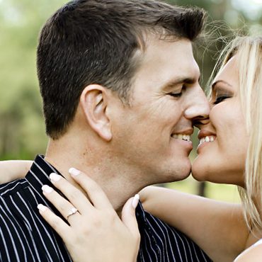 A couple initiating a kiss.