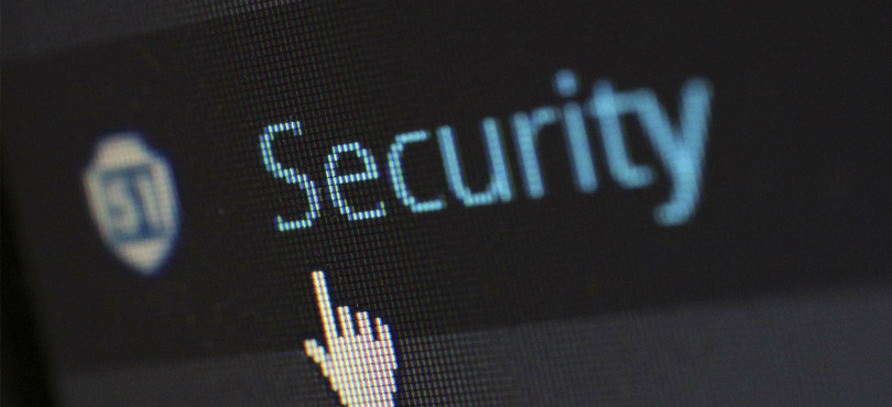 A graphics image with an icon pointing towards security.